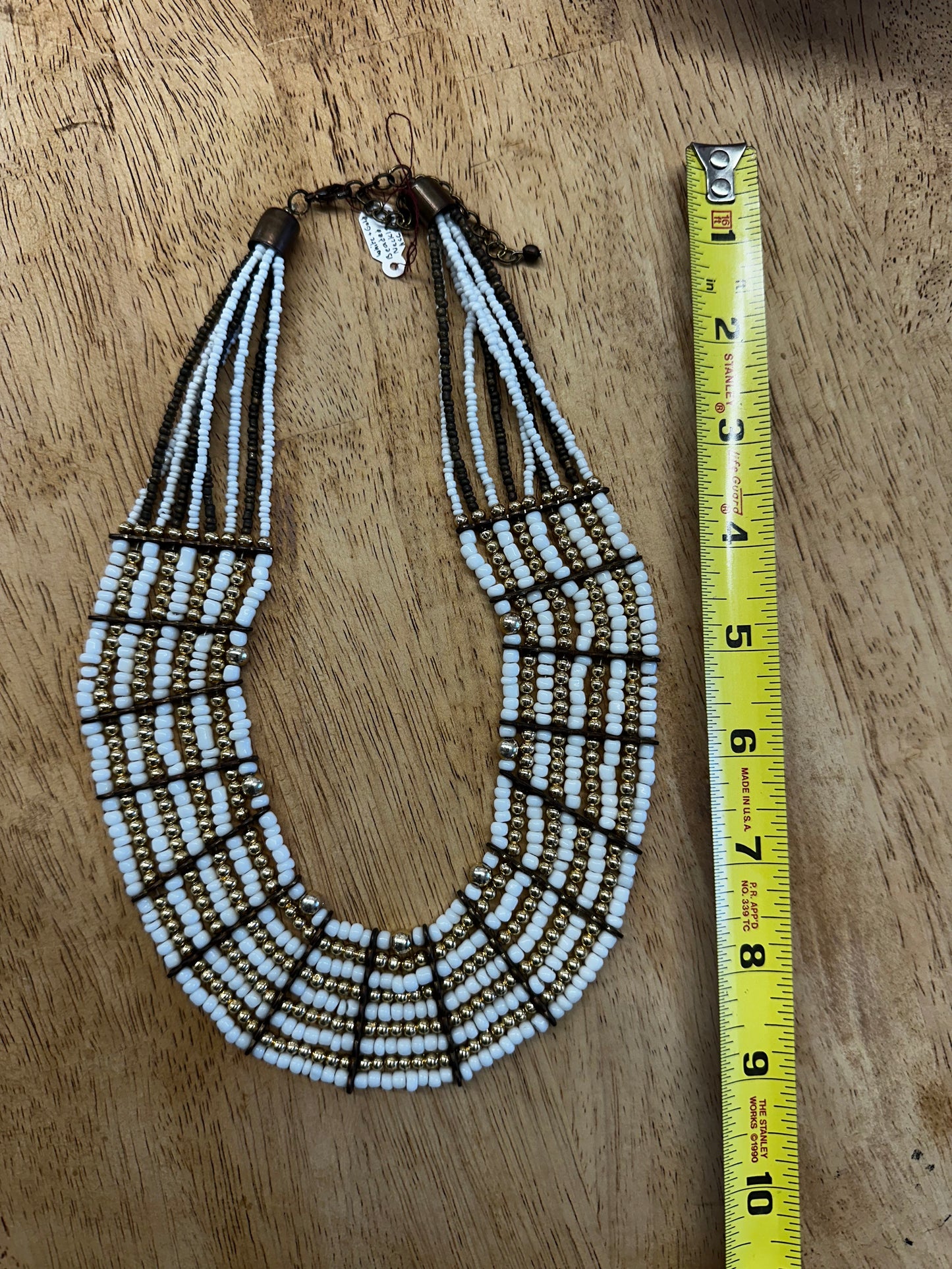 White & Gold beaded necklace.