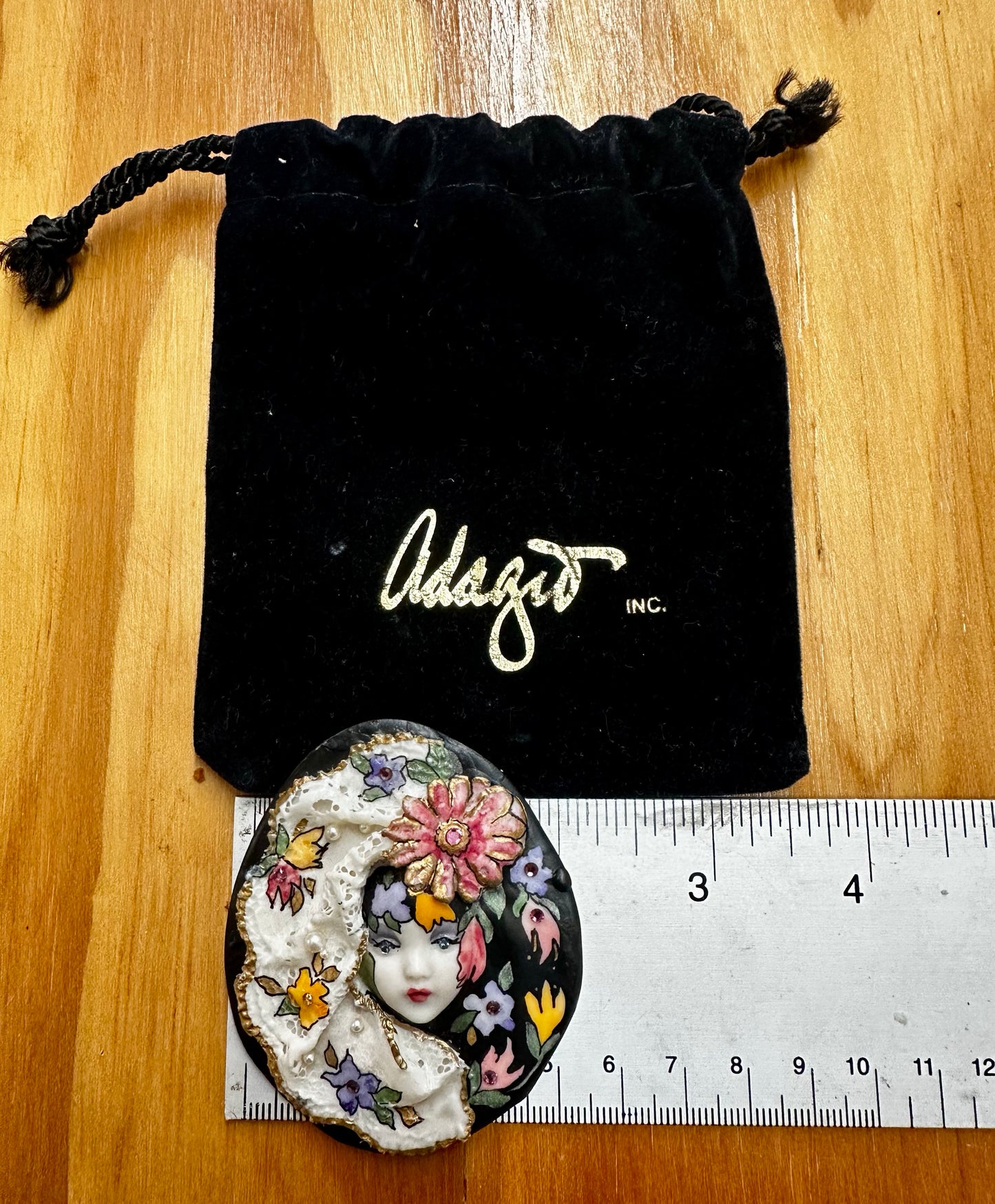 Adagio hand painted porcelian pendent.