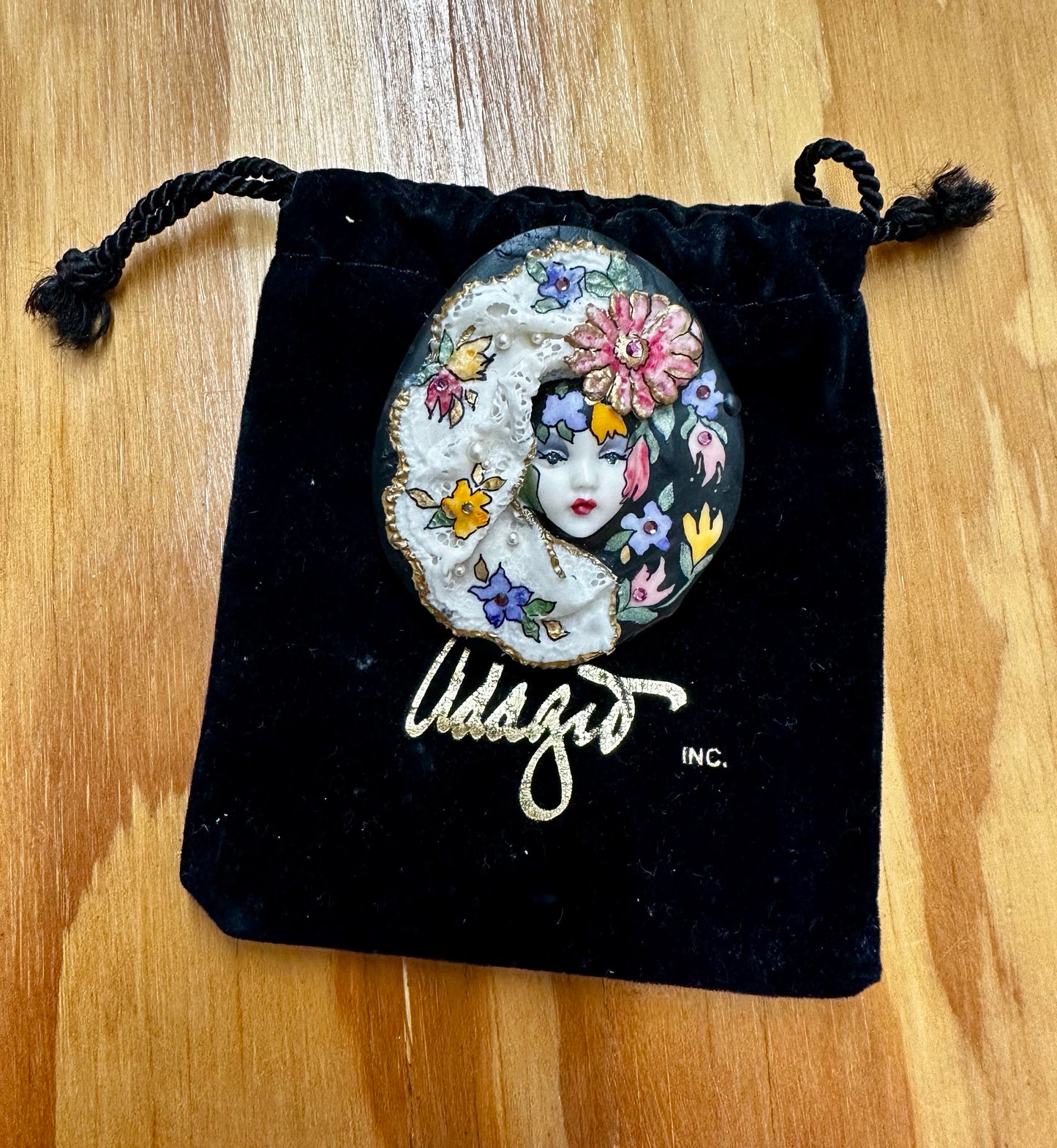 Adagio hand painted porcelian pendent.